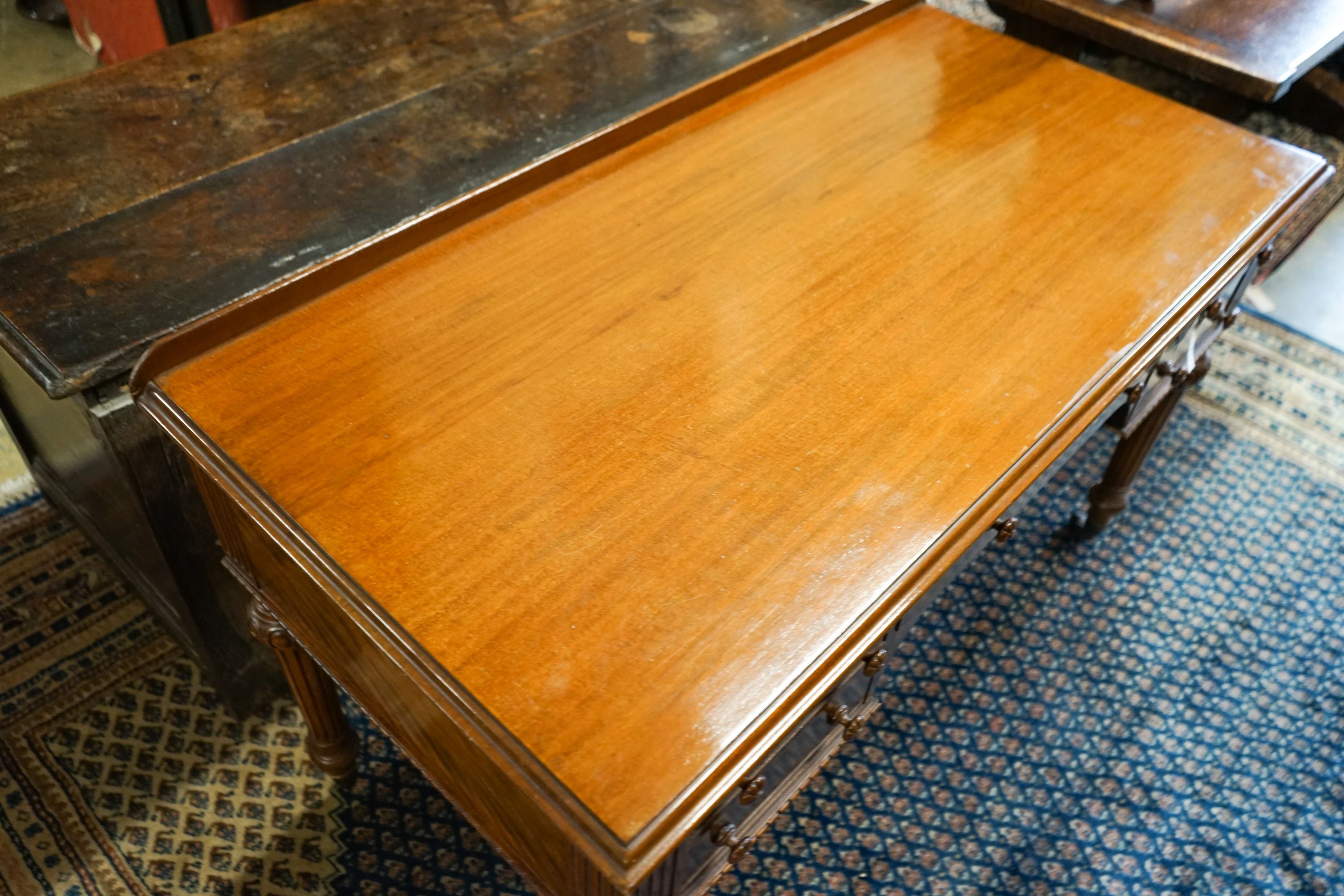A Victorian mahogany dressing-cum-writing table